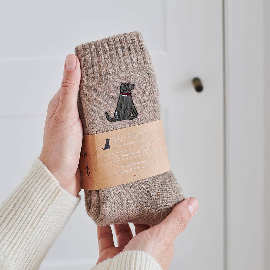 Brown sock with black dog illustration.