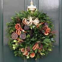 Spruce, Ferns, and Oranges Wreath